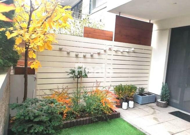 dwupokojowe w apartamentowcu, 2 ogródki i garaż