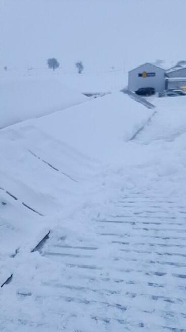 Profesjonalne odśnieżanie dachów, parkingów i podjazdów