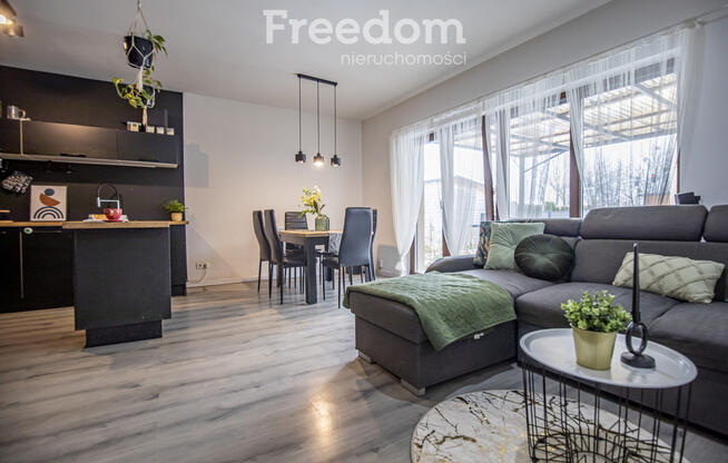 Nowoczesny bliźniak z garażem i tarasem