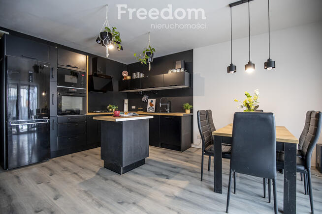 Nowoczesny bliźniak z garażem i tarasem