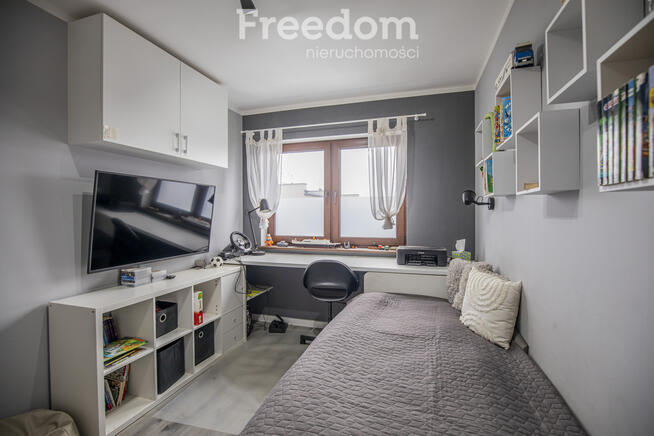 Nowoczesny bliźniak z garażem i tarasem