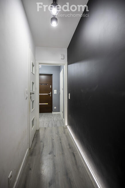 Nowoczesny bliźniak z garażem i tarasem