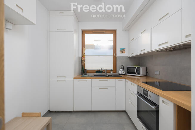 W cenie garaż i internet