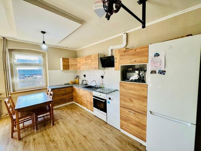 Dwupoziomowe mieszkanie z ogródkiem w Pszowie