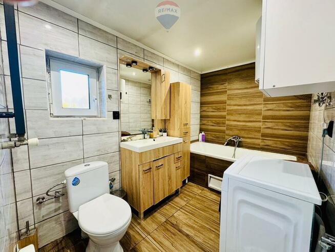 Dwupoziomowe mieszkanie z ogródkiem w Pszowie