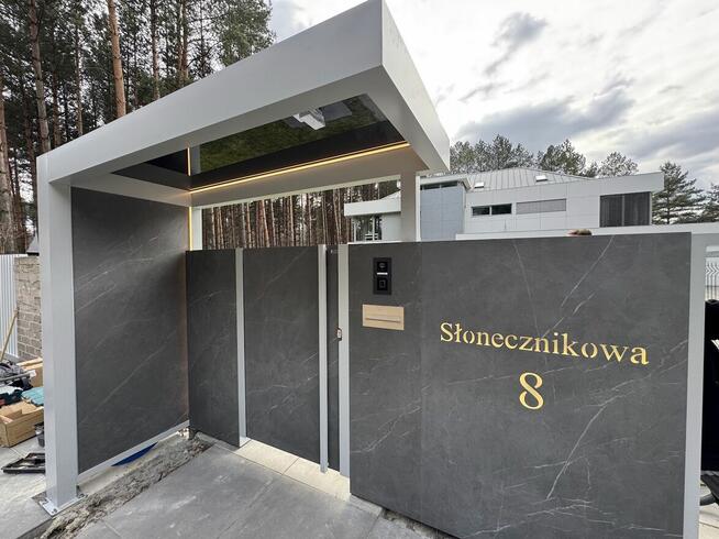 Nowoczesne ogrodzenia, Brama chowana w podłoże, Nowoczesne