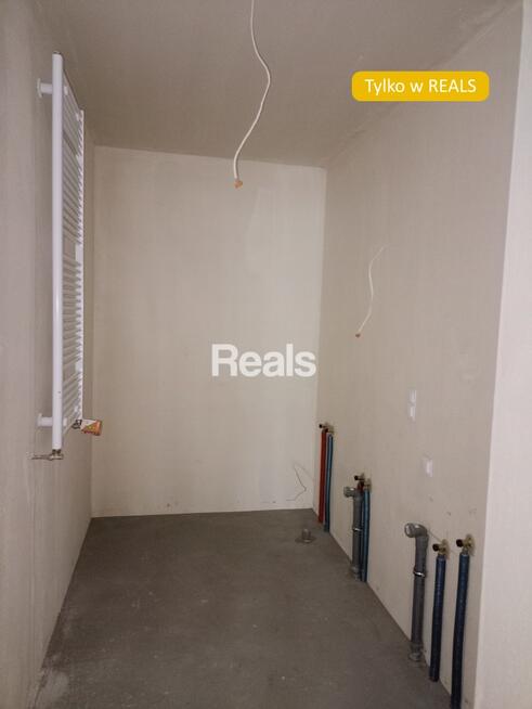 Słoneczna kawalerka z ogródkiem.