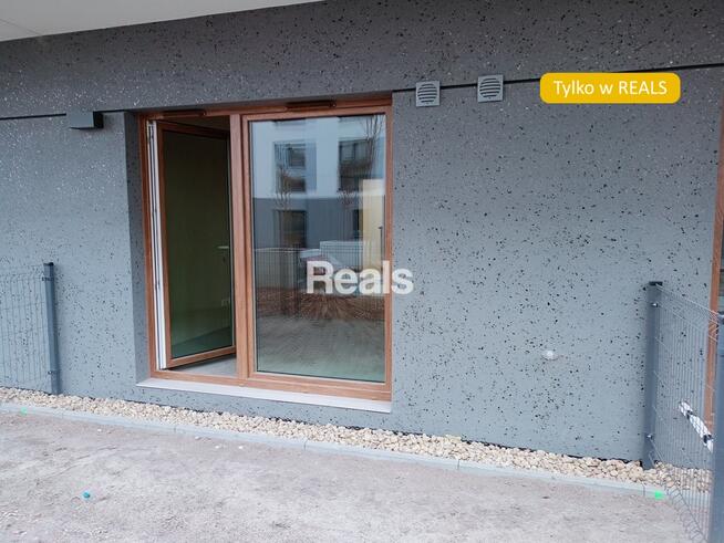 Słoneczna kawalerka z ogródkiem.