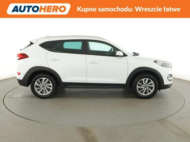 Hyundai Tucson navi klima auto grzane fotele kamera i czujniki parkowania