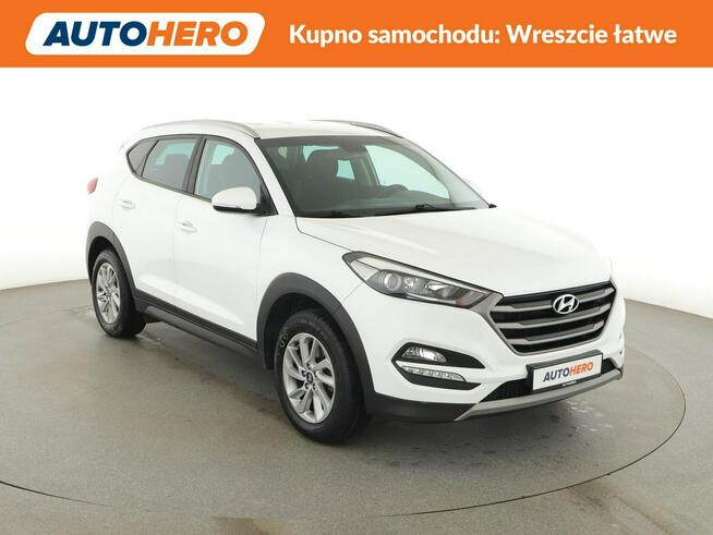 Hyundai Tucson navi klima auto grzane fotele kamera i czujniki parkowania