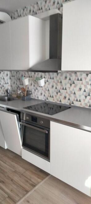 Kawalerka z balkonem i miejscem postojowym