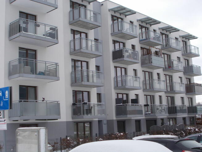 Kawalerka z balkonem i miejscem postojowym