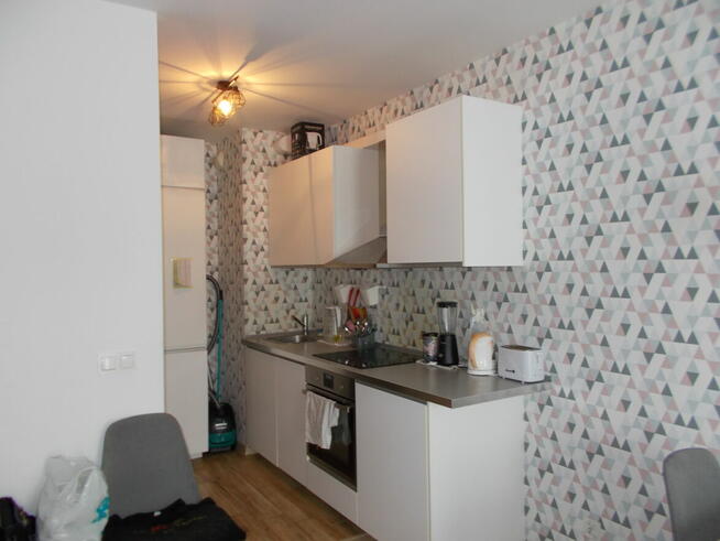 Kawalerka z balkonem i miejscem postojowym