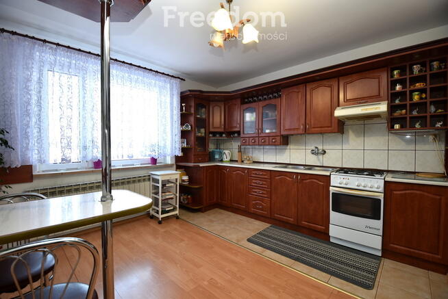 Wolnostojący dom z częścią usługową, gm. Praszka