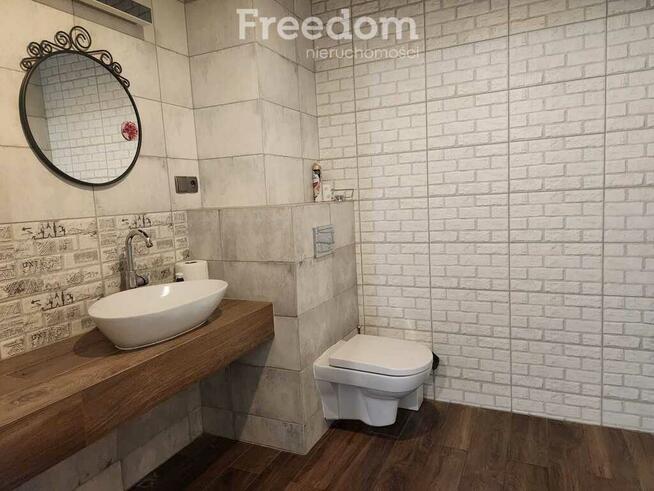 Lokal usługowy na parterze z dużymi witrynami