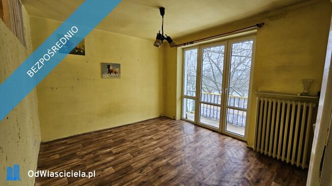 Przestronna kawalerka 37 m² z widokiem na park, w cichym bloku z cegły.