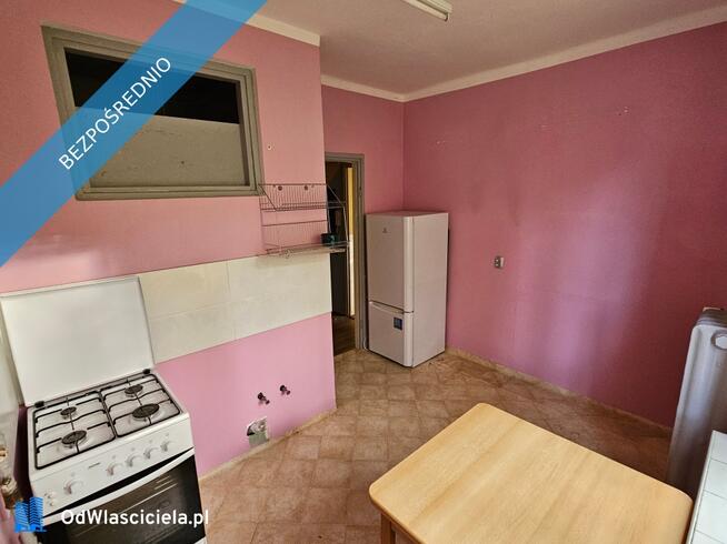 Przestronna kawalerka 37 m² z widokiem na park, w cichym bloku z cegły.