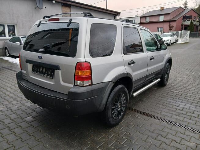 Ford Maverick 2,3i 4X4 SPECJAL alufelgi klima skóry szyberdach relingi stanBDB