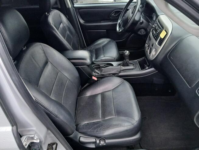 Ford Maverick 2,3i 4X4 SPECJAL alufelgi klima skóry szyberdach relingi stanBDB