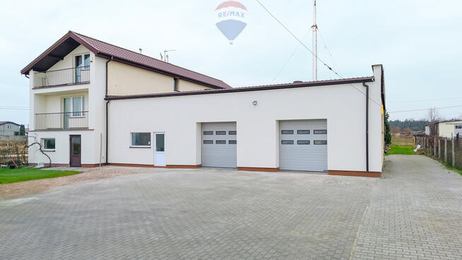 Lokal przy trasie E7 | magazyn + biuro | parking