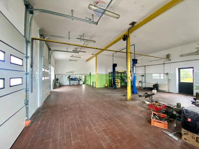 Lokal przy trasie E7 | magazyn + biuro | parking