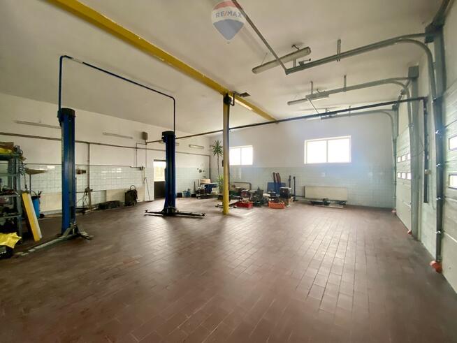 Lokal przy trasie E7 | magazyn + biuro | parking