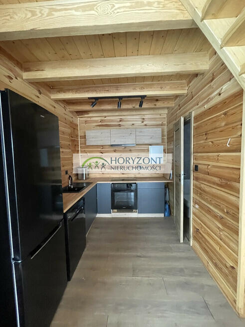 Dom na jeziorem Tuchomskim