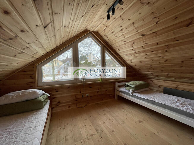 Dom na jeziorem Tuchomskim