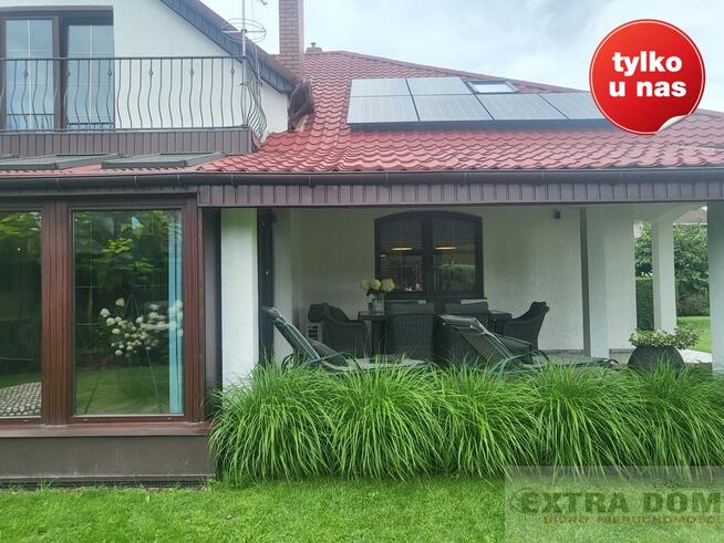 DOM Z PIĘKNYM OGRODEM W KAMERALNEJ OKOLICY