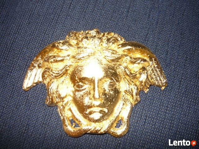 Pozłacana gorgona Versace -szlagmetal