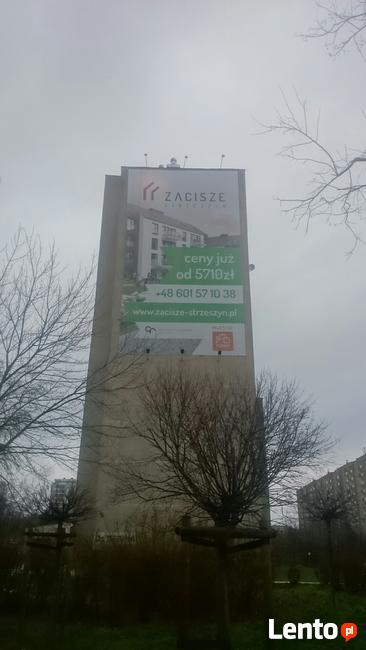 Montaż reklam, prace na wysokości, alpinizm przemysłowy