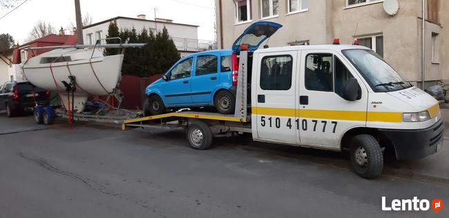 Pomoc drogowa Olsztyn 24 holowanie transport laweta 7 osób