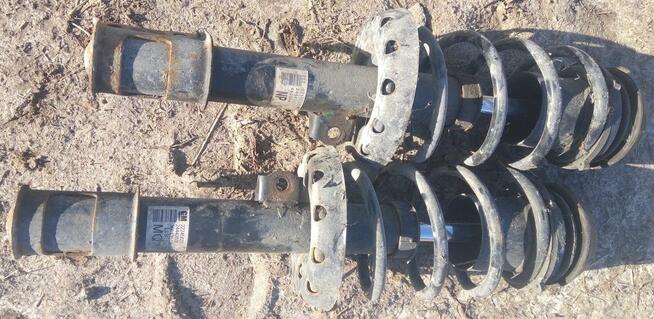 kolumna MC Pherson prawa / lewa od OPEL ASTRA G