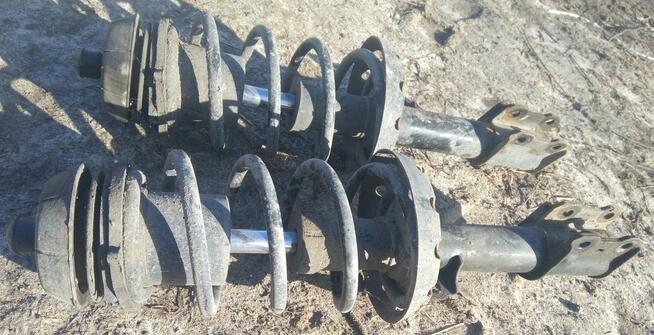 kolumna MC Pherson prawa / lewa od OPEL ASTRA G