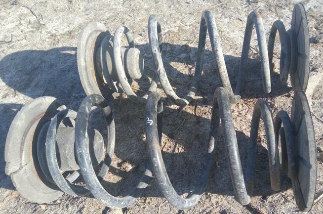 sprężyna tył ASTRA G prawa / lewa