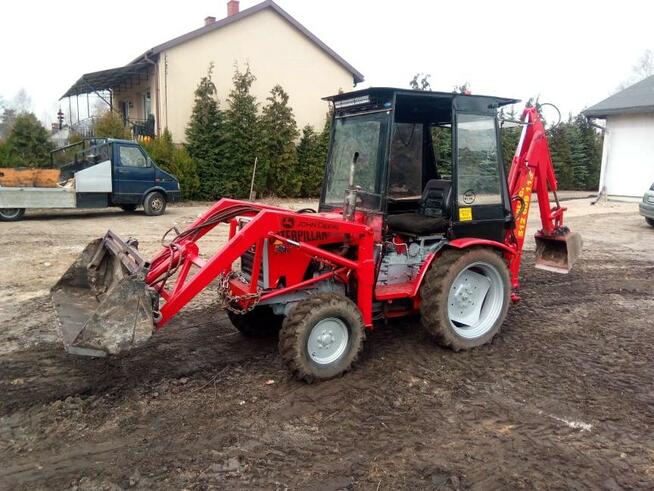 Minikoparka minikoparko-ladowarka wykopy fundamenty wypozycz