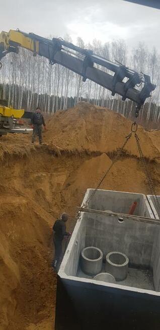 zasypywanie fundamentów, piach, piasek, koparka, wywrotka