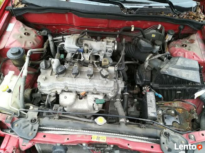 Części Nissan Almera N16 Lift 1.5 Hatchback Z10G Czerwony