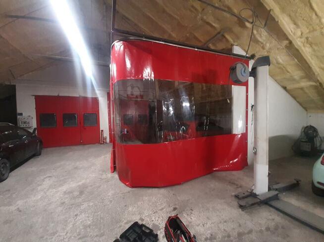 Kotara podwieszana na wózkach w szynie łukowej z montażem.