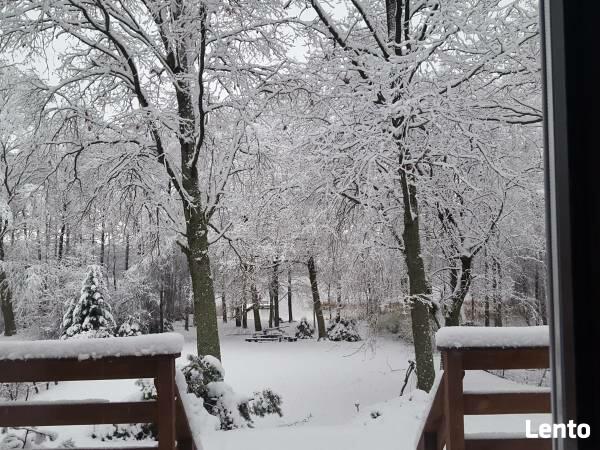 Dom całoroczny na Mazurach z własną plażą i pomostem.