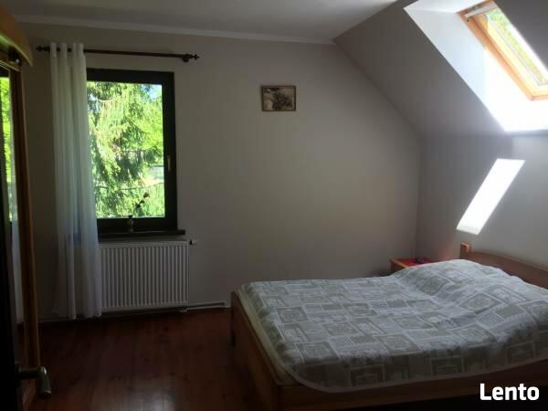 Dom całoroczny na Mazurach z własną plażą i pomostem.