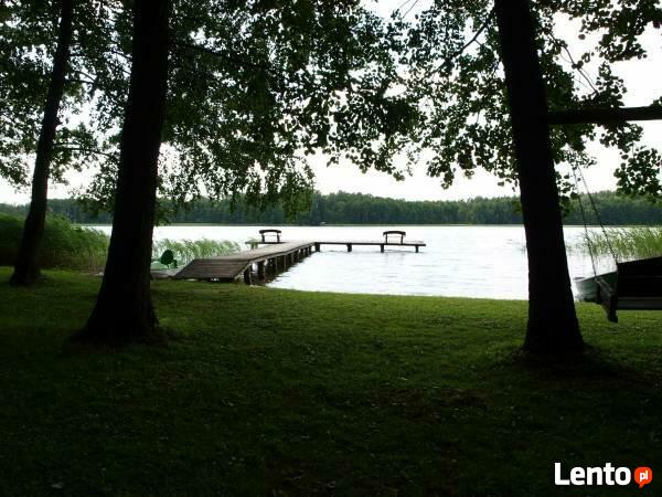 Dom całoroczny na Mazurach z własną plażą i pomostem.