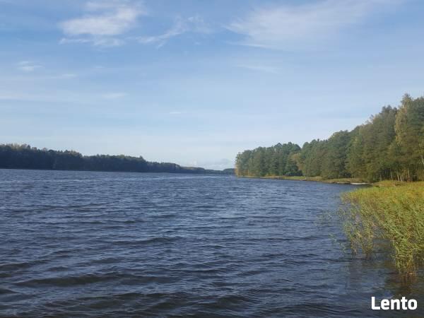 Dom całoroczny na Mazurach z własną plażą i pomostem.