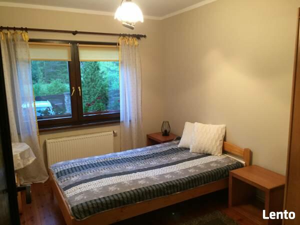 Dom całoroczny na Mazurach z własną plażą i pomostem.