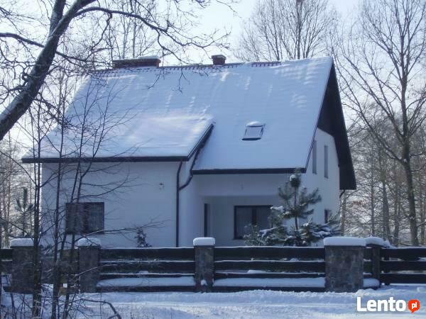 Dom całoroczny na Mazurach z własną plażą i pomostem.