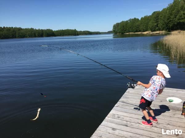 Dom całoroczny na Mazurach z własną plażą i pomostem.