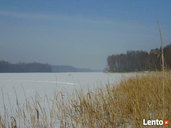 Dom całoroczny na Mazurach z własną plażą i pomostem.