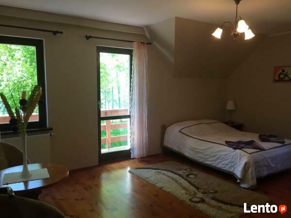 Dom całoroczny na Mazurach z własną plażą i pomostem.