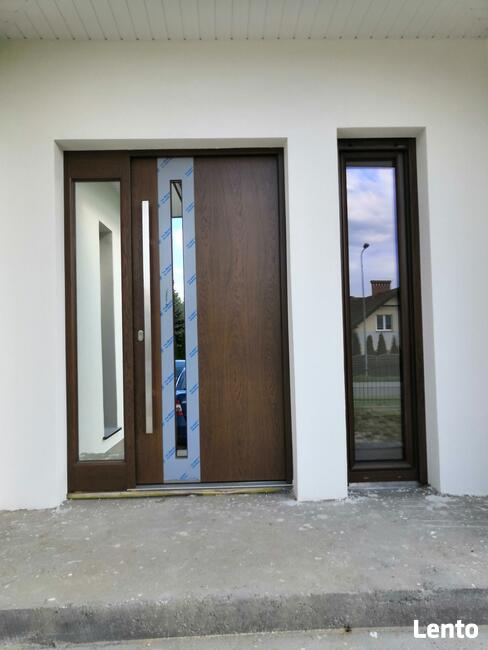 Drewniane drzwi zewnętrzne do domu od producenta Dowóz GRATIS