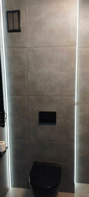 Remonty łazienek. Układanie płytek itd.